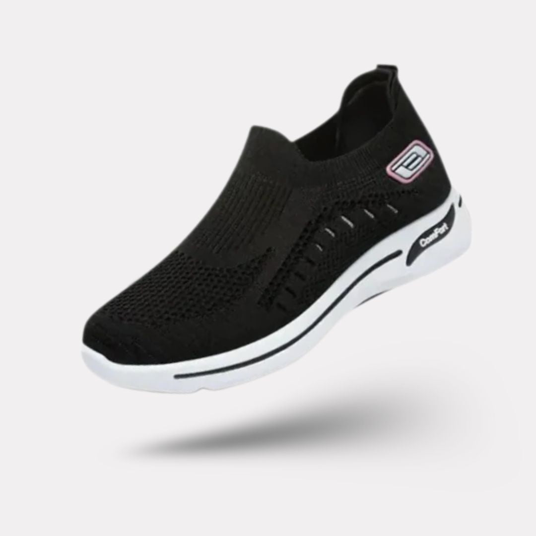 "Baskets orthopédiques pour femme en gris foncé, style moderne et semelles confortables, vue latérale élégante."