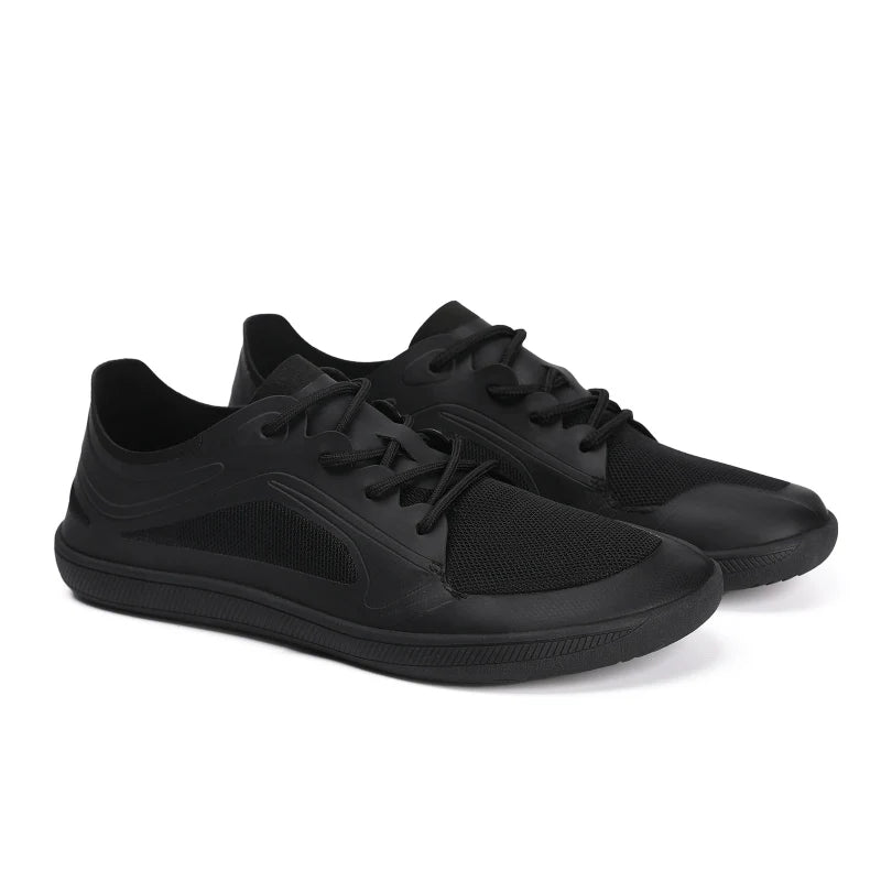 Baskets pieds nus unisexes noires, confort maximal pour marche quotidienne, semelle souple et respirante.