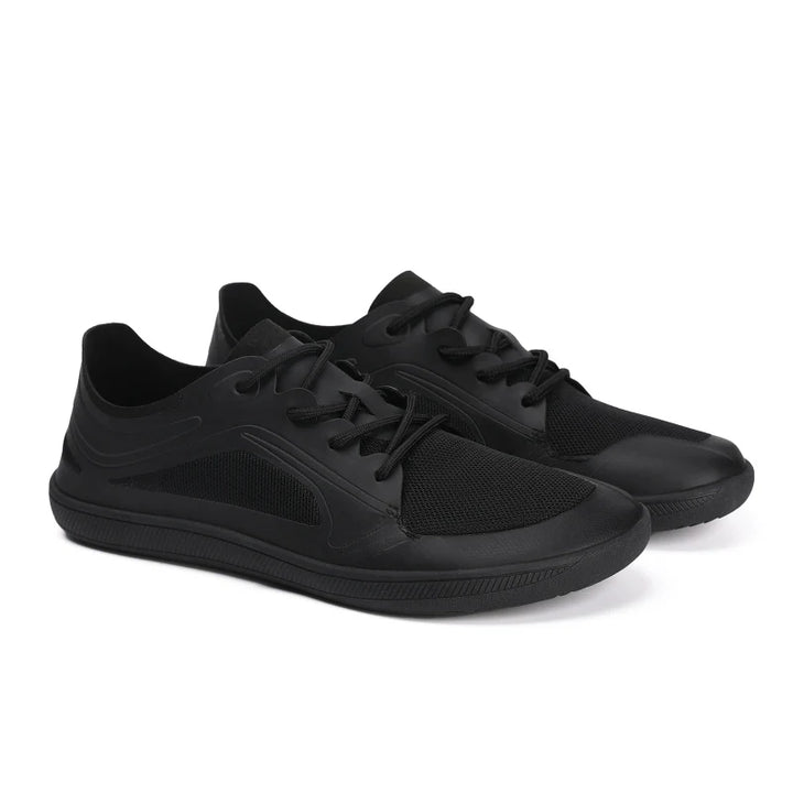 Baskets pieds nus unisexes noires, confort maximal pour marche quotidienne, semelle souple et respirante.