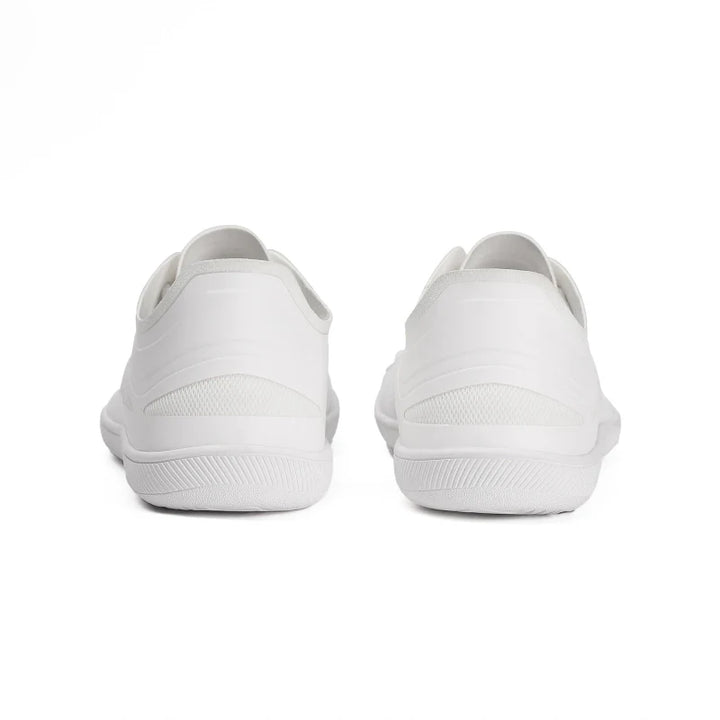 Baskets pieds nus unisexes élégantes, confort maximal et design épuré pour un look minimaliste.