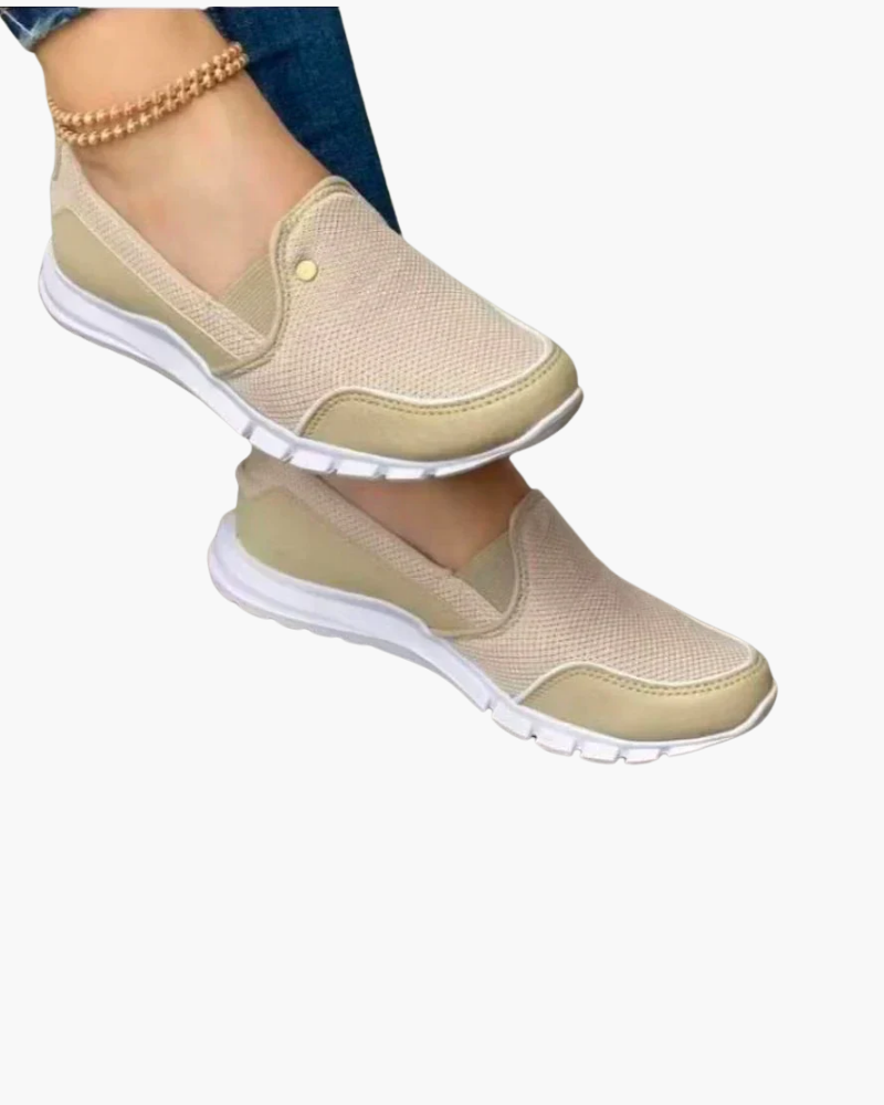 "Baskets sans lacets femme, design élégant, matière aérée, semelle souple pour confort et style moderne quotidien."