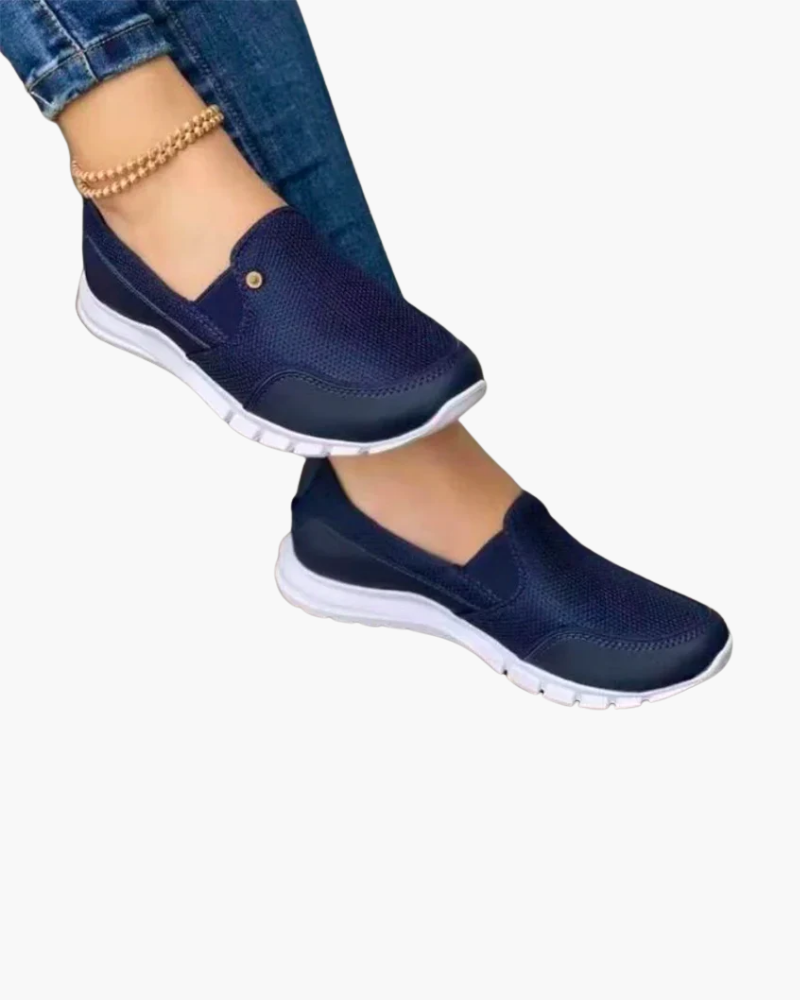 "Baskets sans lacets femme, design élégant, matière aérée, semelle souple pour confort et style moderne quotidien."