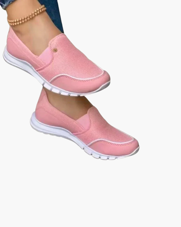 "Baskets sans lacets femme, design élégant, matière aérée, semelle souple pour confort et style moderne quotidien."