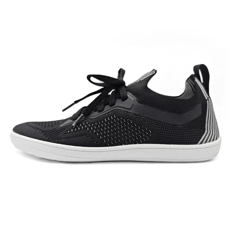 Baskets unisexes pieds nus larges et flexibles pour un confort naturel optimal. Idéales pour marche ou sport léger.