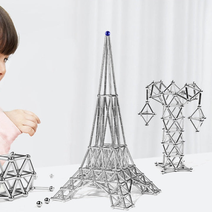 Bâtons et boules magnétiques colorés pour enfants. Jeu construction créative, développe la motricité fine et l'imagination.