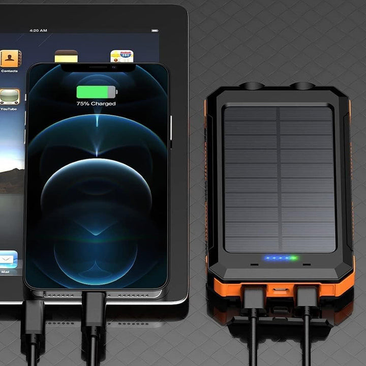 "Batterie externe solaire robuste avec ports USB rapides, panneaux solaires intégrés, LED, boussole et mousqueton"