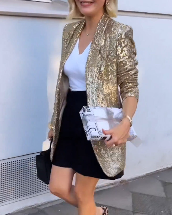 Blazer femme glamour doré, design tendance à paillettes pour un look festif chic.
