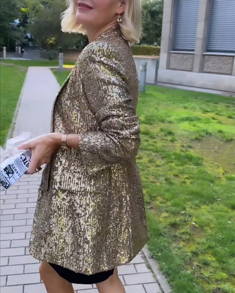 Blazer femme doré à paillettes, ajoute une touche glamour et chic à toute tenue de soirée.