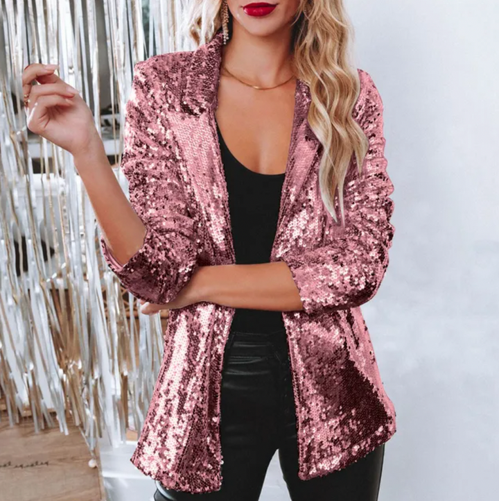 Blazer femme moderne à paillettes, coupe élégante pour une occasion festive chic. Look glamour garanti.