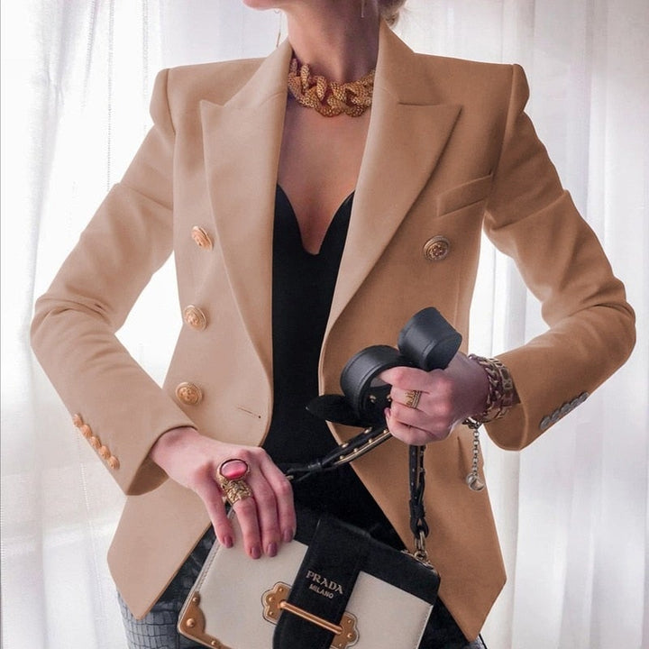 Blazer élégant pour femme, couleur unie, avec boutons dorés. Parfait pour le bureau ou tenue chic.