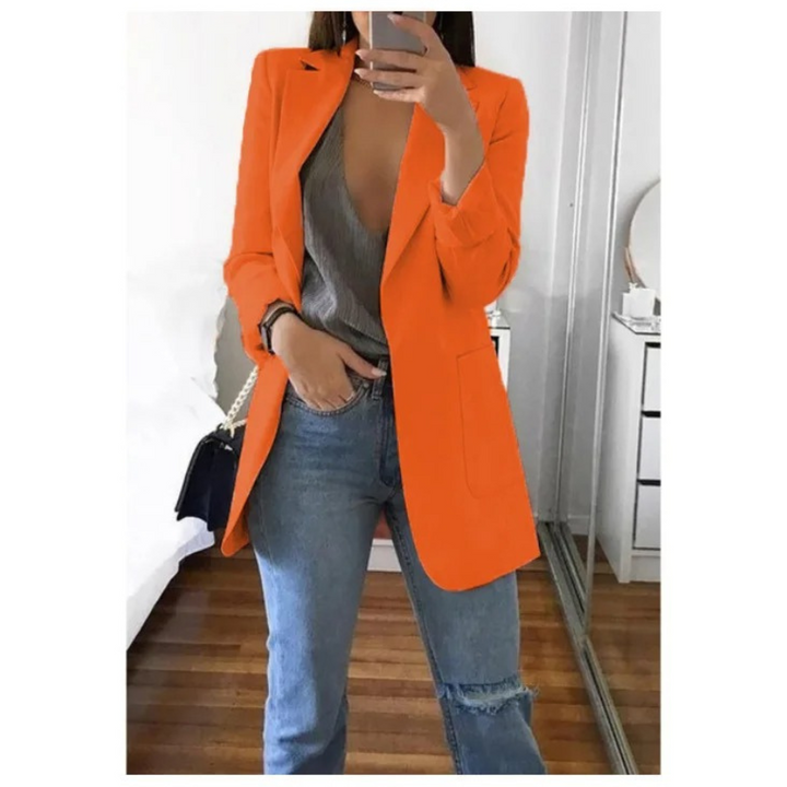 Blazer long femme élégant, coupe raffinée.  Idéal pour toutes occasions.