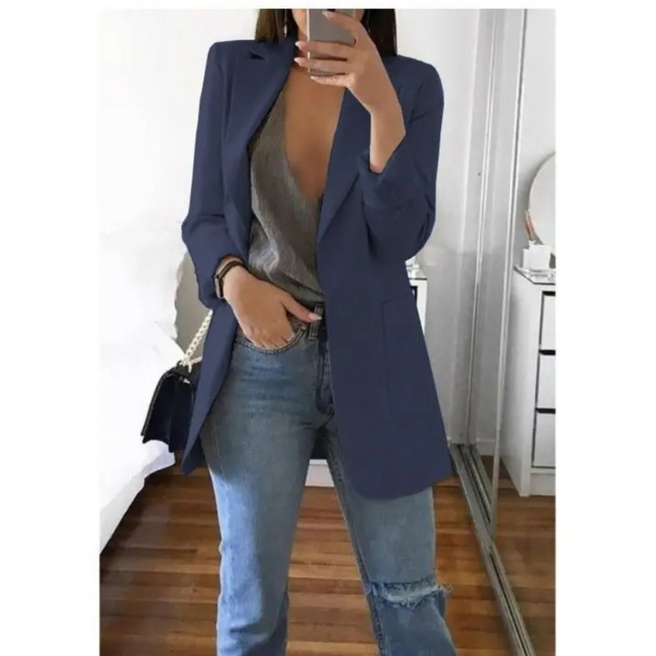 Blazer long femme élégant, coupe raffinée.  Idéal pour toutes occasions.