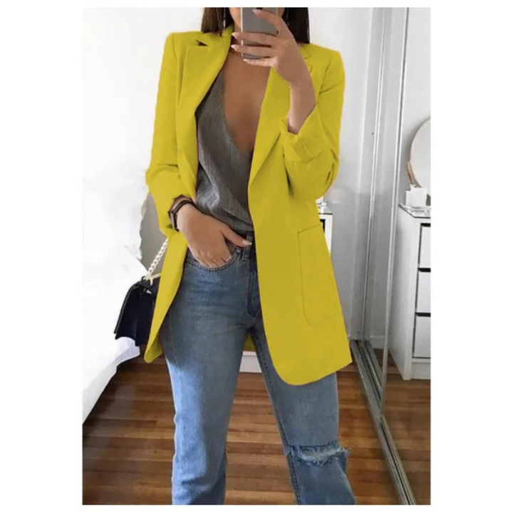 Blazer long femme élégant, coupe raffinée.  Idéal pour toutes occasions.