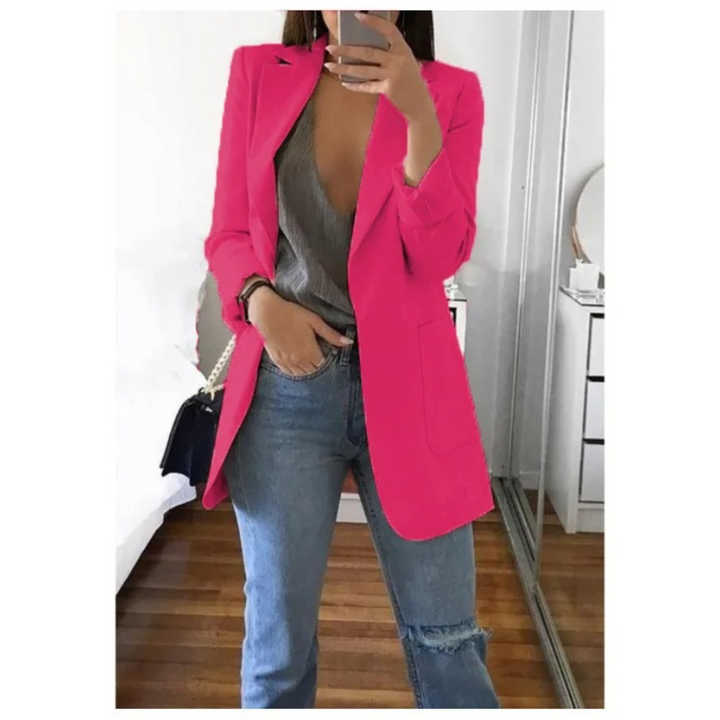 Blazer long femme élégant, coupe raffinée.  Idéal pour toutes occasions.