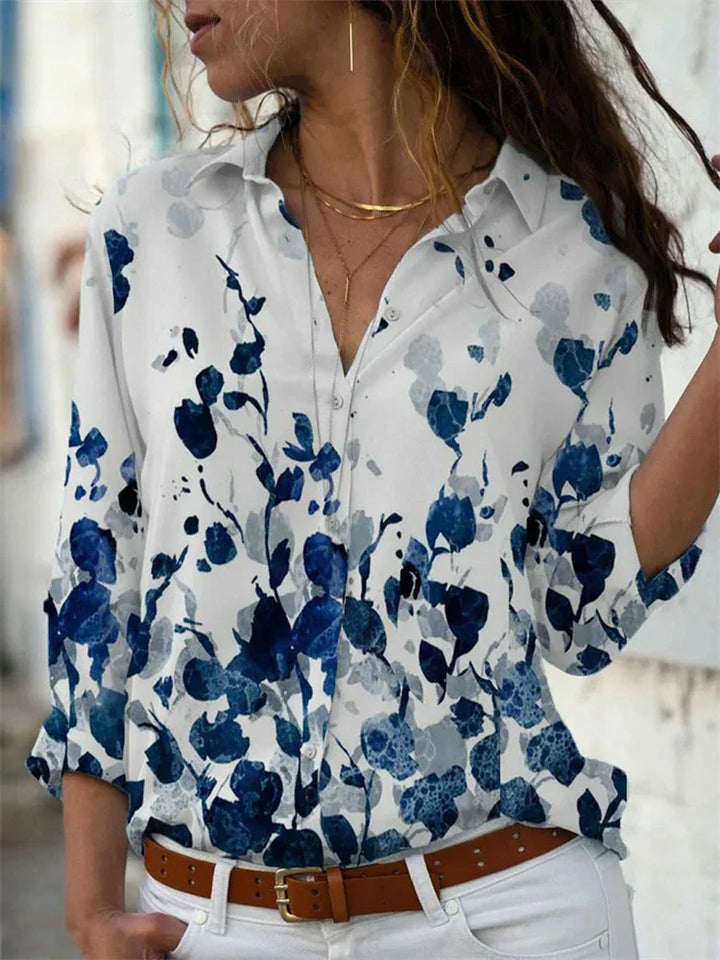 Blouse féminine évasée, couleurs vibrantes, manches longues, idéale pour l'été et occasions spéciales, style chic et élégant.