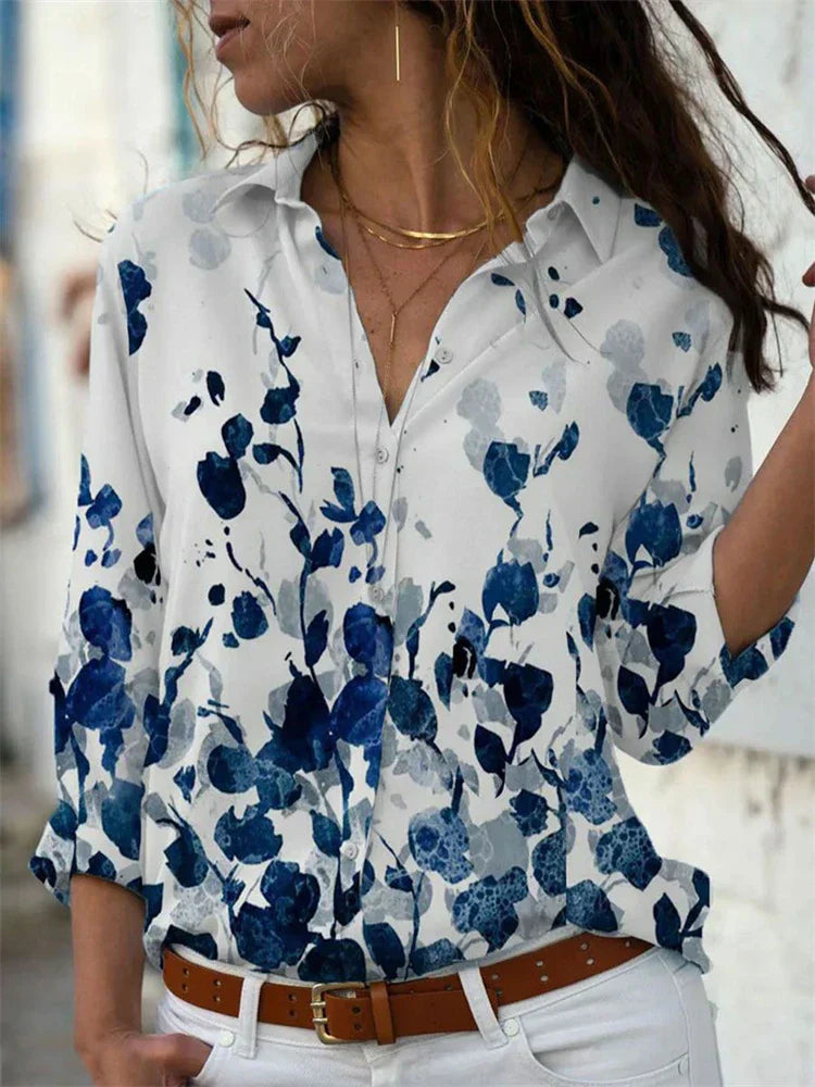 Blouse féminine évasée, couleurs vibrantes, manches longues, idéale pour l'été et occasions spéciales, style chic et élégant.