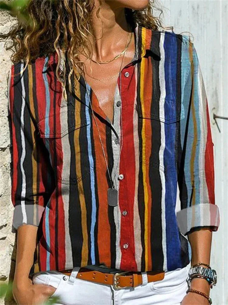 Blouse féminine évasée, couleurs vibrantes, manches longues, idéale pour l'été et occasions spéciales, style chic et élégant.