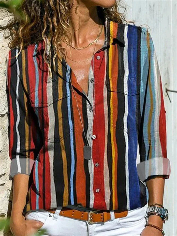 Blouse féminine évasée, couleurs vibrantes, manches longues, idéale pour l'été et occasions spéciales, style chic et élégant.