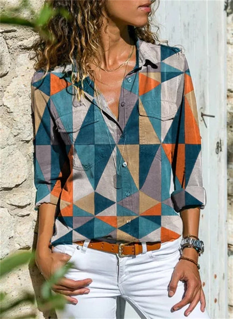 Blouse féminine évasée, couleurs vibrantes, manches longues, idéale pour l'été et occasions spéciales, style chic et élégant.