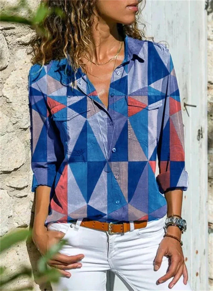 Blouse féminine évasée, couleurs vibrantes, manches longues, idéale pour l'été et occasions spéciales, style chic et élégant.
