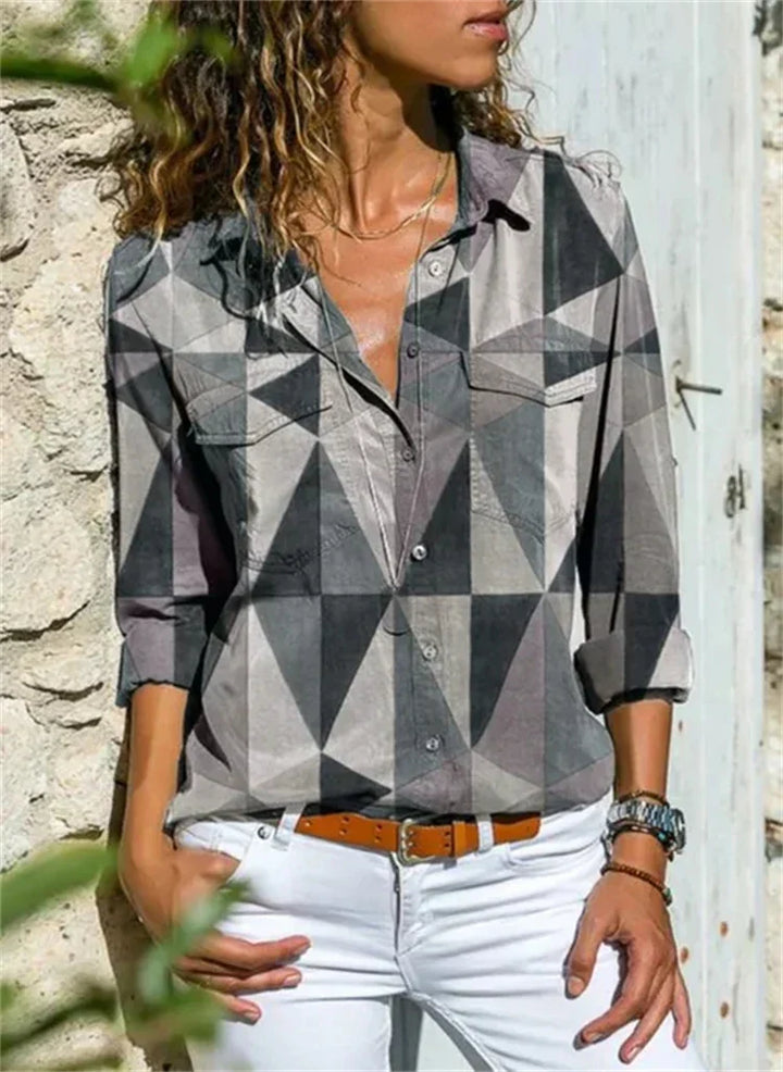 Blouse féminine évasée, couleurs vibrantes, manches longues, idéale pour l'été et occasions spéciales, style chic et élégant.