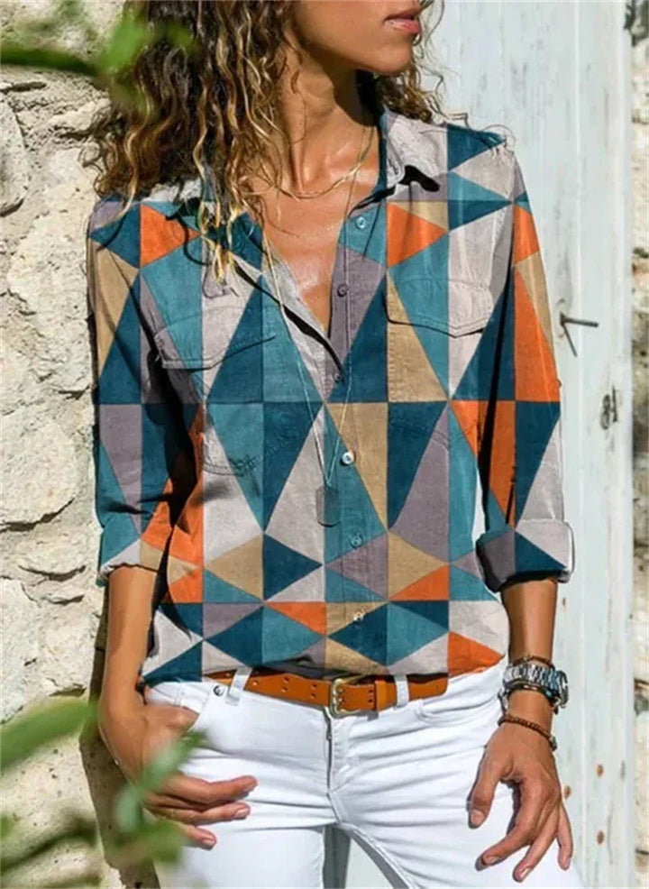 Blouse féminine évasée, couleurs vibrantes, manches longues, idéale pour l'été et occasions spéciales, style chic et élégant.