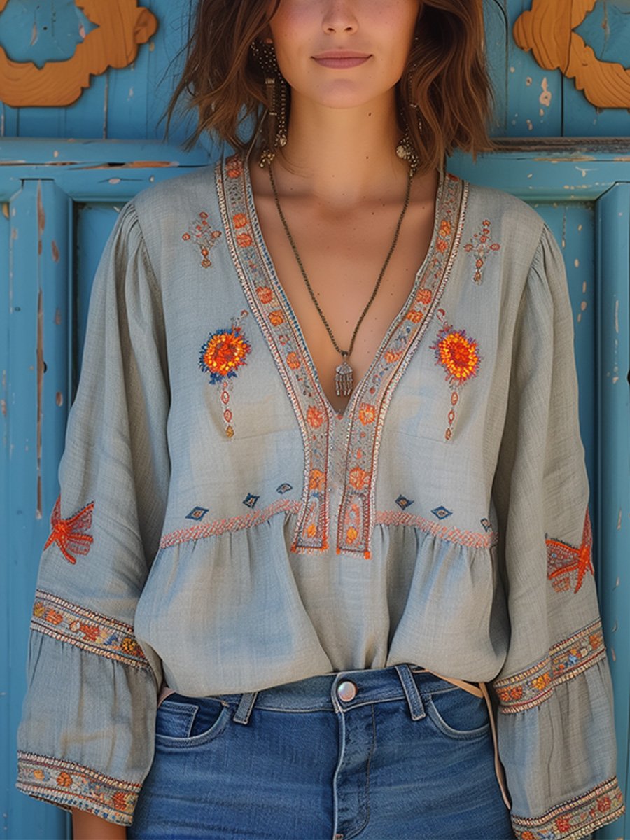 Blouse femme bohème avec broderie authentique, parfaite pour l'été et un style chic décontracté.