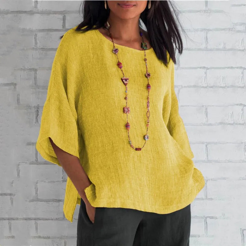 Haut femme Saori, chic et fluide, pour un style versatile. Blouse élégante décontractée pour printemps et été.