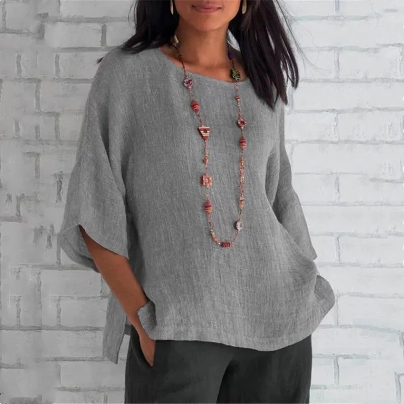 Blouse femme Saori moderne et fluide, allie chic et décontraction pour une tenue printanière élégante.