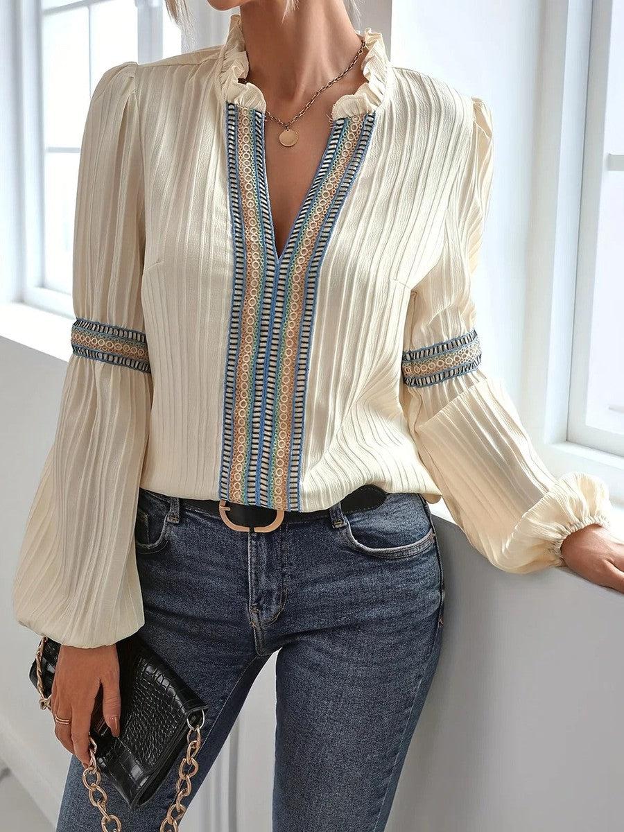 Blouse vintage femme à manches longues, un top élégant pour toute occasion. Chic et intemporelle, mode féminine.