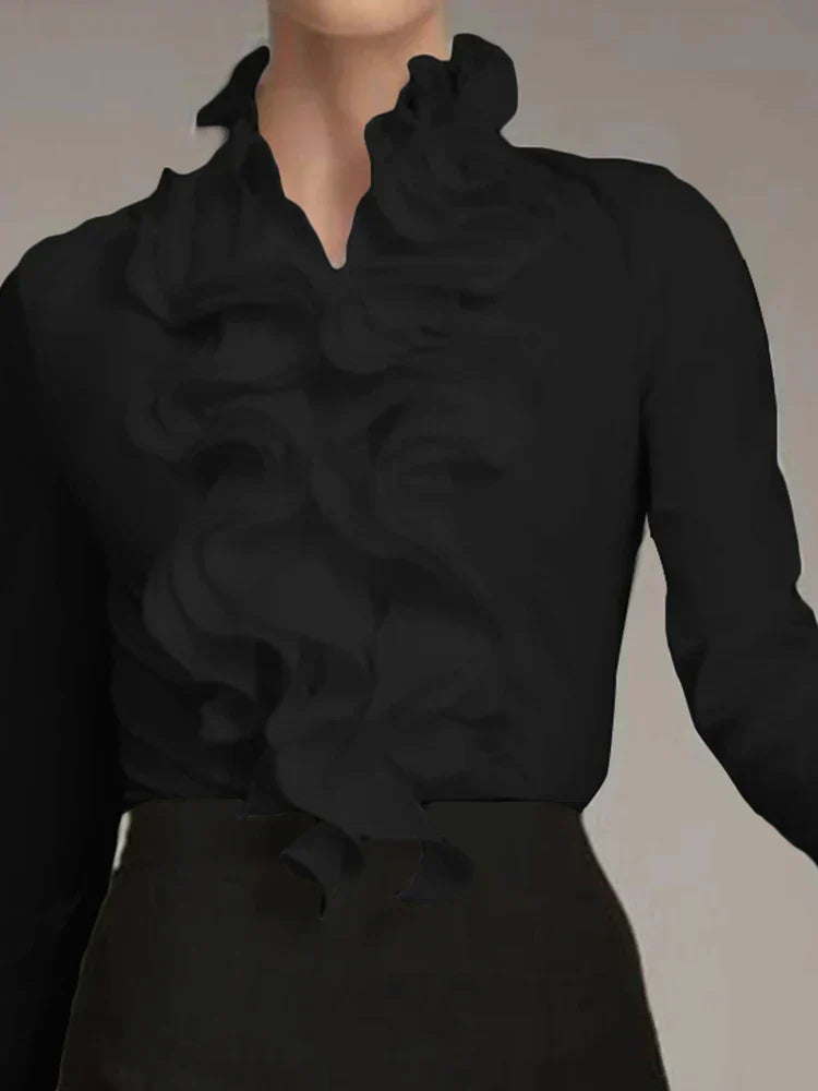 Blouse femme chic à volants, manches longues, idéale pour bureau ou sortie élégante et féminine.