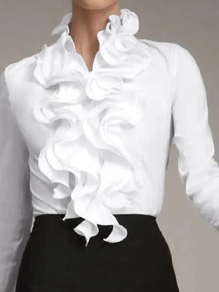 Chemise élégante à volants pour femme, manches longues, parfaite pour un look de bureau ou décontracté.