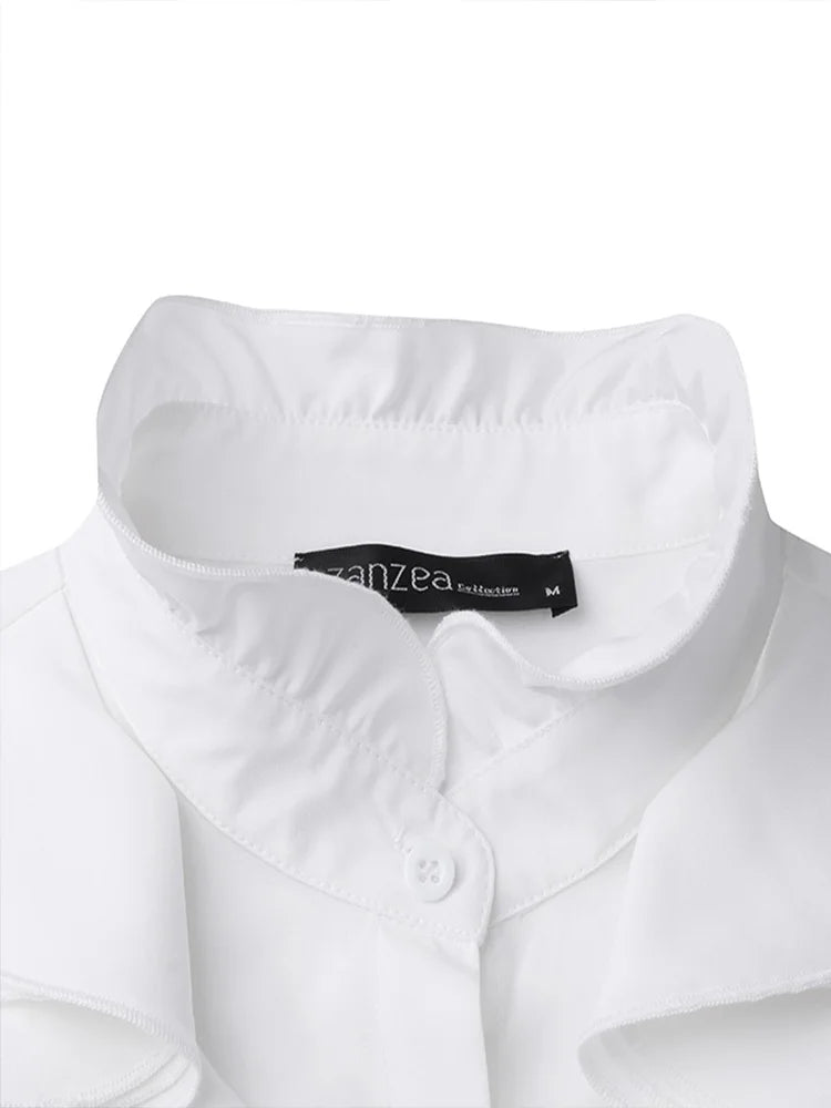 Blouse femme moderne à volants, coupe élégante, manches longues, vêtement chic pour toute occasion.