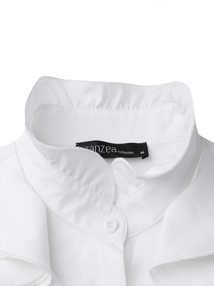 Blouse femme moderne à volants, coupe élégante, manches longues, vêtement chic pour toute occasion.