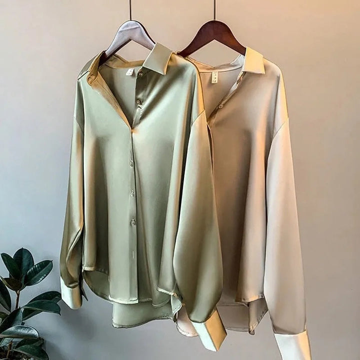Blouse femme coupe droite, manches retroussables.  Tissu léger, style élégant et décontracté.  Parfait pour le bureau ou les 