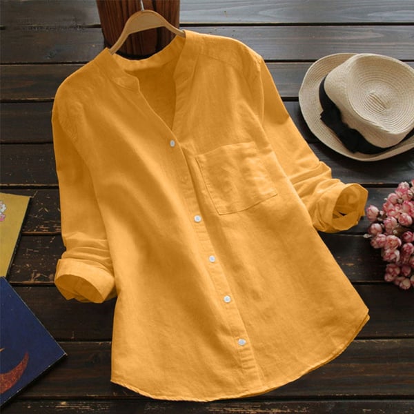 Haut femme décontracté et polyvalent, coupe aérée. Blouse chic à manches longues pour un style printanier moderne et confortable.