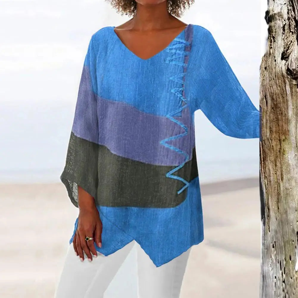Blouse femme estivale Harper à manches longues, col en V, dentelle et broderies, silhouette aérienne et fluide.