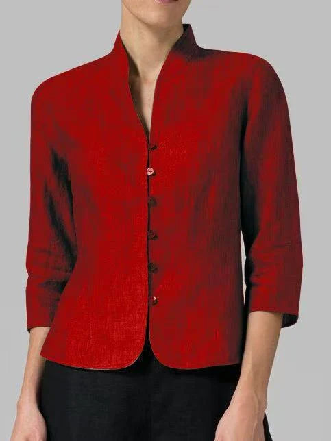 Blouse femme à col montant et manches trois-quarts. Un chemisier décontracté chic, parfait pour le travail ou le quotidien.