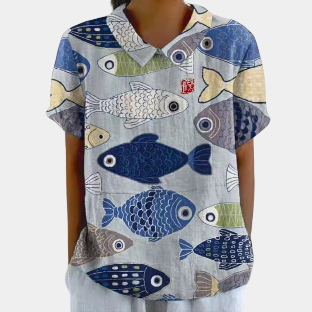 "Blouse femme manches courtes imprimé fleuri pastel, col rond, couleur abricot, chic et confortable pour un style décontracté