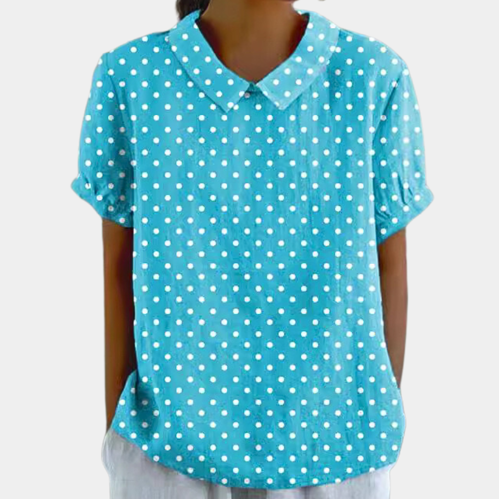 "Blouse femme manches courtes imprimé fleuri pastel, col rond, couleur abricot, chic et confortable pour un style décontracté