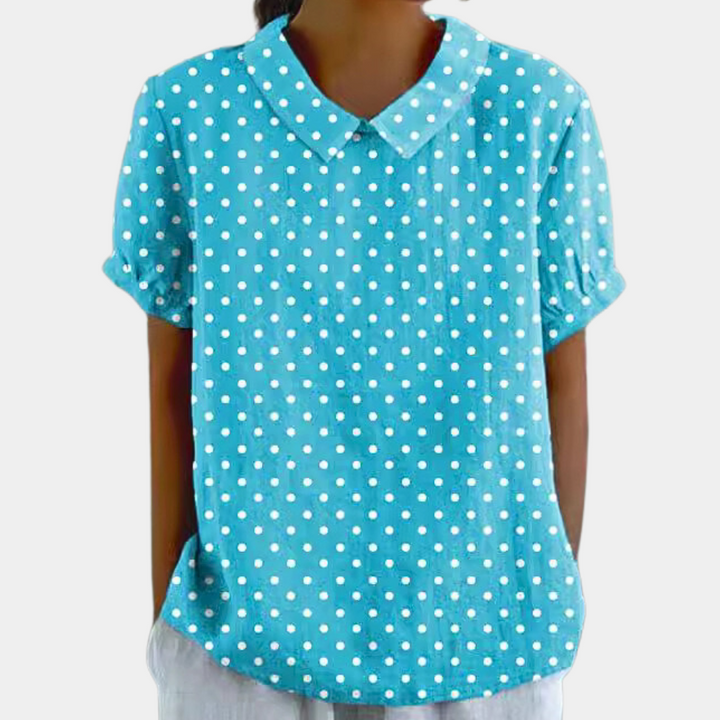 "Blouse femme manches courtes imprimé fleuri pastel, col rond, couleur abricot, chic et confortable pour un style décontracté