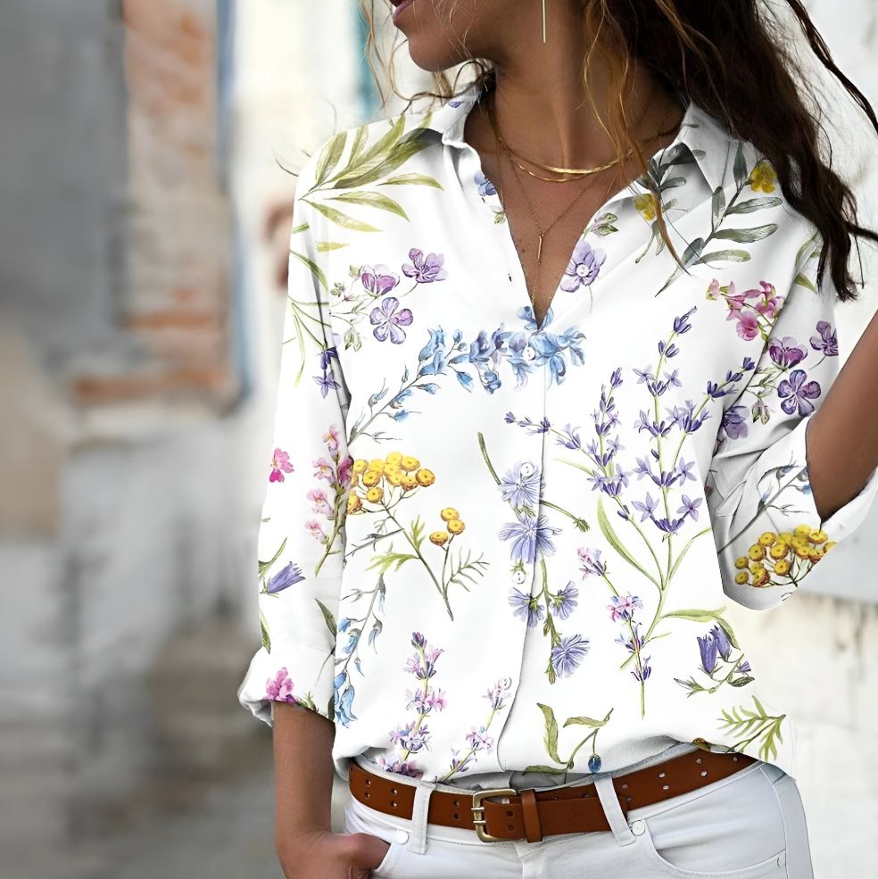Blouse femme Norina, coupe ample et imprimé tendance. Un chemisier décontracté chic pour votre garde-robe estivale.