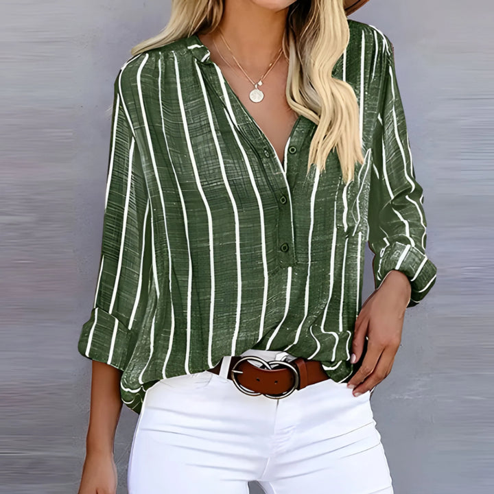 "Blouse femme rayée élégante et confortable avec manches longues et détails noués en tissu léger, style moderne."