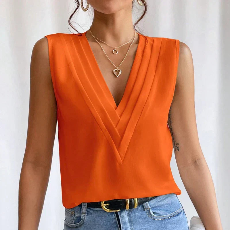 Blouse sans manches pour femme, idéale été/printemps. Style élégant et confortable.