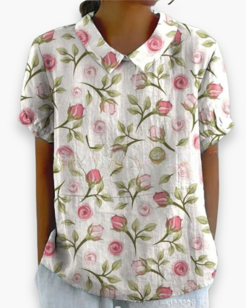 "Blouse florale décontractée pour femme, légère, motifs floraux délicats, tissu aéré, coupe confort, style printanier."