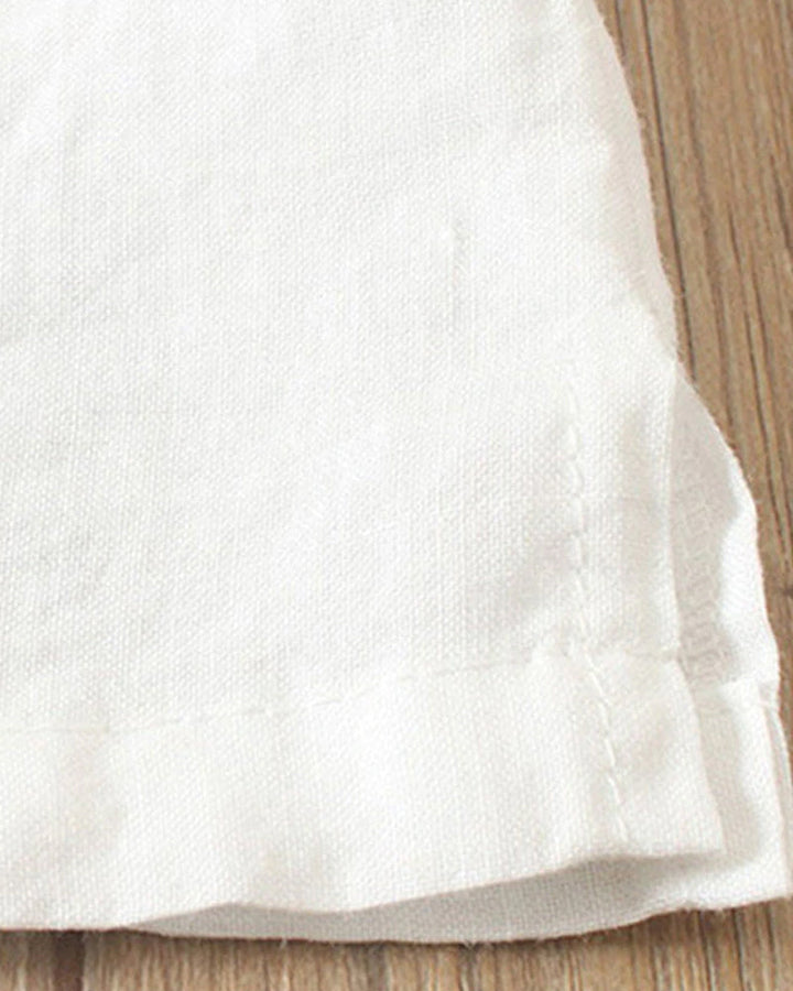 Haut femme fluide avec boutonnage, manches longues, pour un look élégant et décontracté estival.