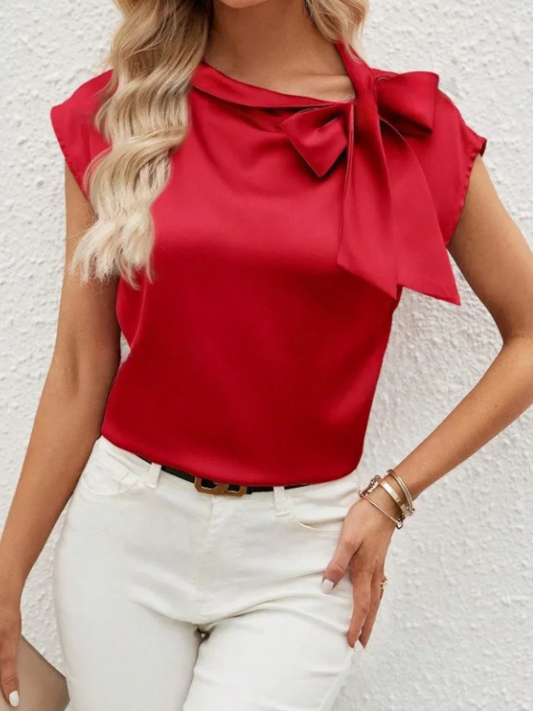 Chemisier chic femme à nœud, une blouse fluide et élégante, idéale pour toutes occasions, du bureau à la ville.