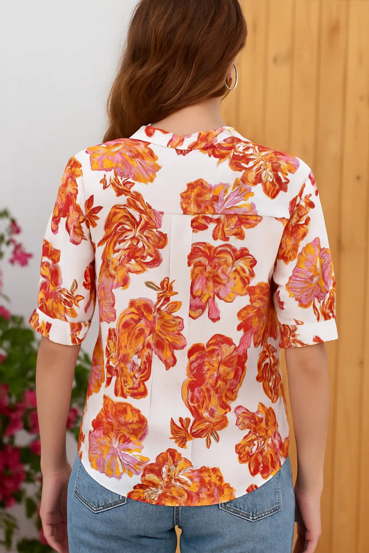 Blouse femme longue et fluide pour une élégance quotidienne. Style chic parisien, idéale pour toutes tailles.