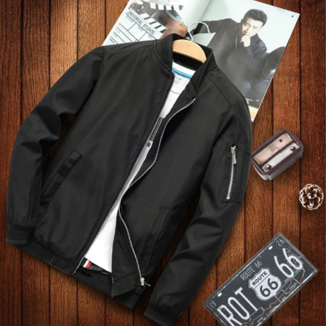 "Blouson bomber homme multi-poches urbain, coupe-vent, élégant, couleur foncée, style décontracté et chic."
