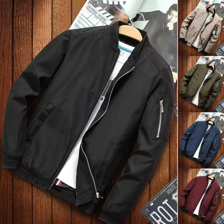 "Blouson bomber homme multi-poches urbain, coupe-vent, élégant, couleur foncée, style décontracté et chic."
